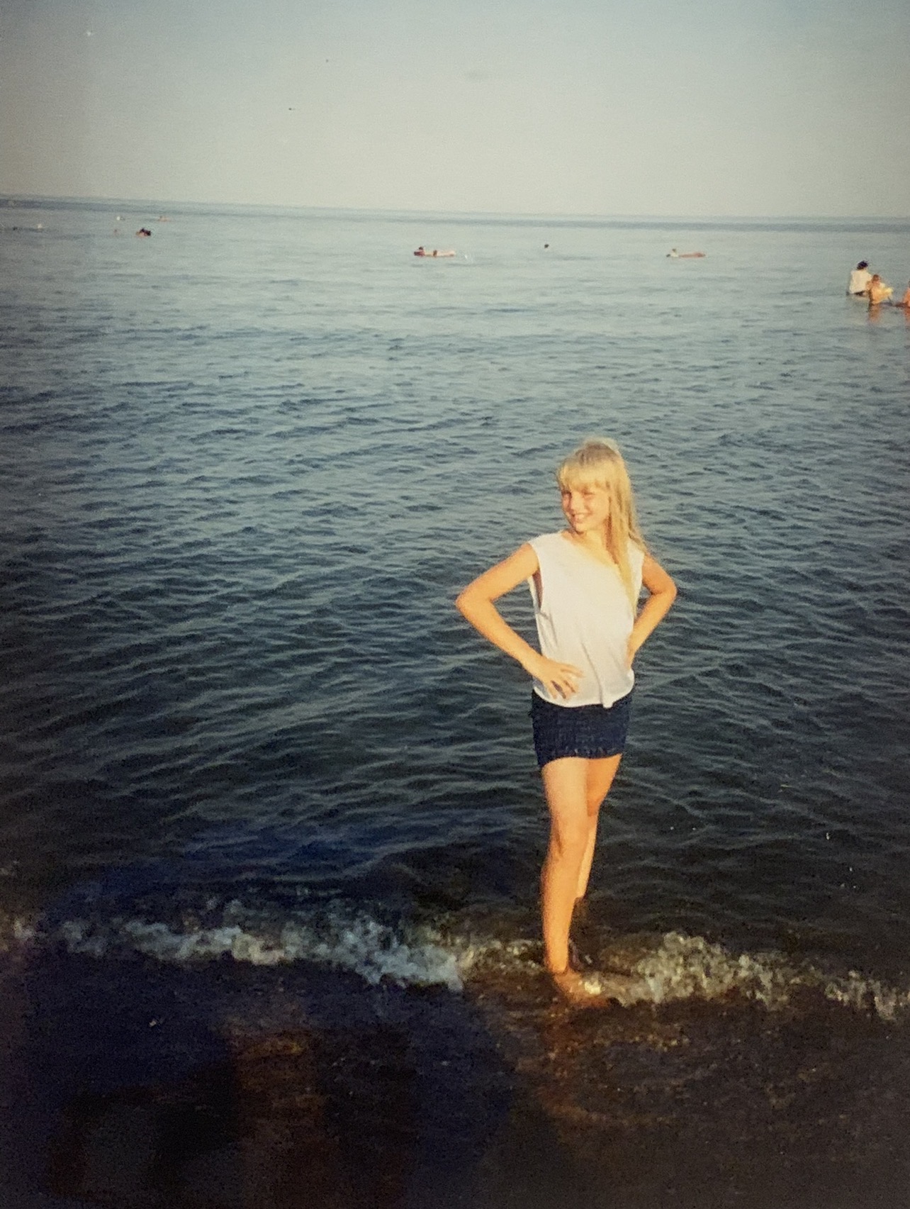 Marina Stognieva as a child on the coast of the Sea of Azov in 1996